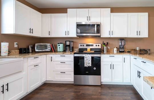 kitchen, range, microwave, granite countertops