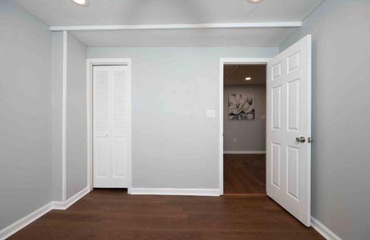 bedroom, closet, vinyl flooring