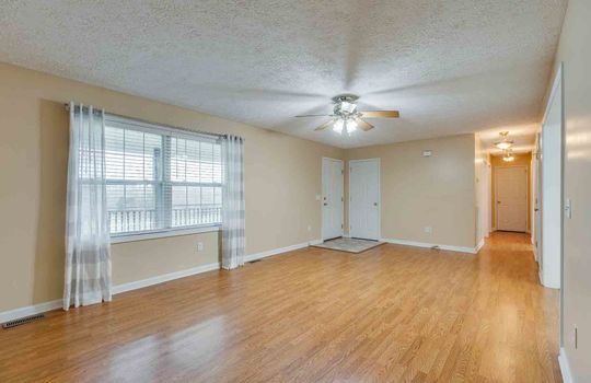 Living room, Windows, Ceiling Fan, Luxury Vinyl Flooring, Hallway