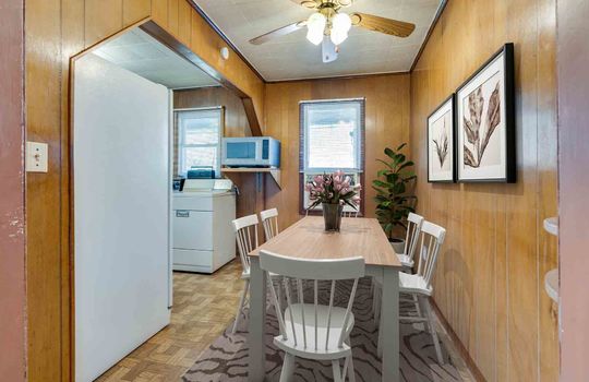 Staged Dining Room, Window, Refrigerator, Washer, Dryer, Paneling Walls, Ceiling Fan