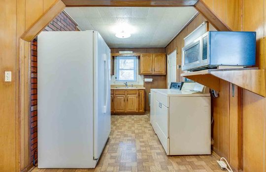 Refrigerator, Washer, Dryer, Window, Kitchen Cabinets