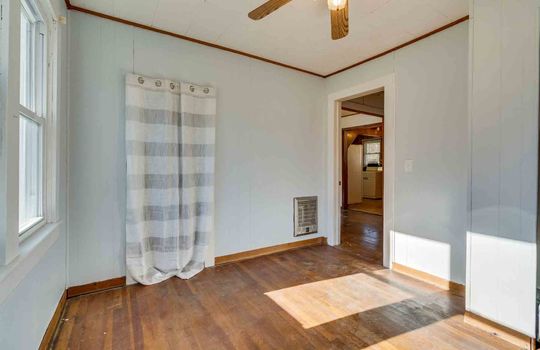 Wood Flooring, Ceiling Fan, Door, Heating Unit, Closet