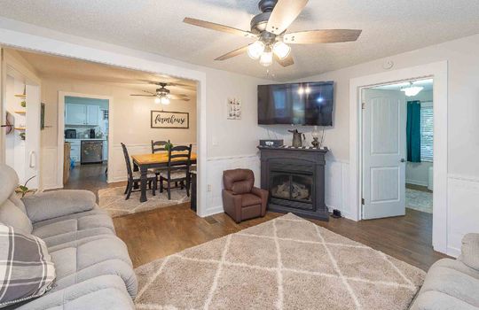Living Room, Ceiling Fan, Luxury Vinyl Flooring, Doorway, Dining Room