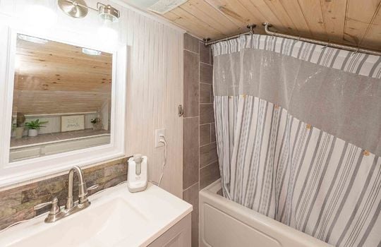 Sink, Vanity, Shower, Tub, Wooden Ceiling