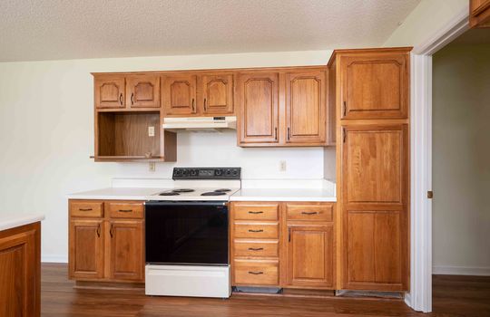 Cabinets, Stove, Doorway, Laminate Flooring