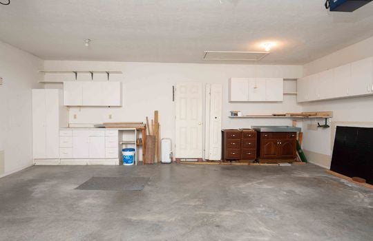 Garage, Concrete Floor, Cabinets Door