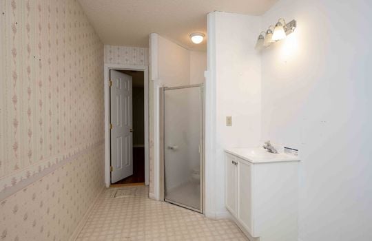 Shower, Sink, Tile Flooring