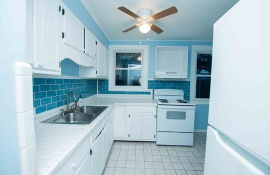 Kitchen, Kitchen Cabinets, Sink, Stove, Windows, Refrigerator
