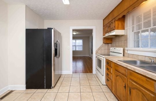 Refrigerator, Stove, Cabinets, Tile, Countertops