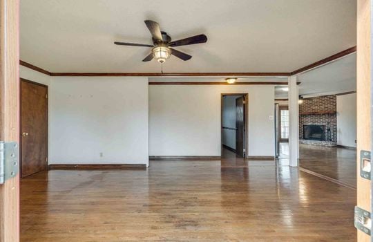 living room, front entrance, ceiling fans, hardwood flooring