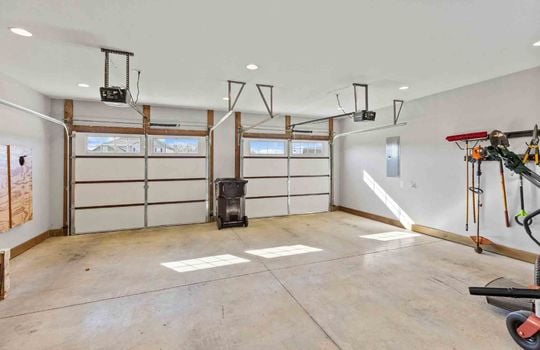 garage, concrete flooring, garage doors
