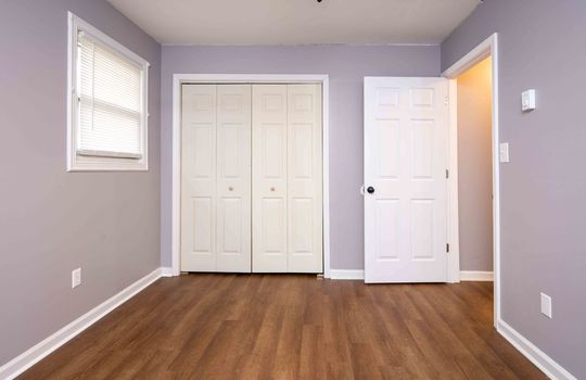 134 Monterey - Bedroom, LVT flooring, doorway, closet