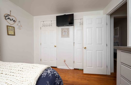 Bedroom, doors, hardwood flooring
