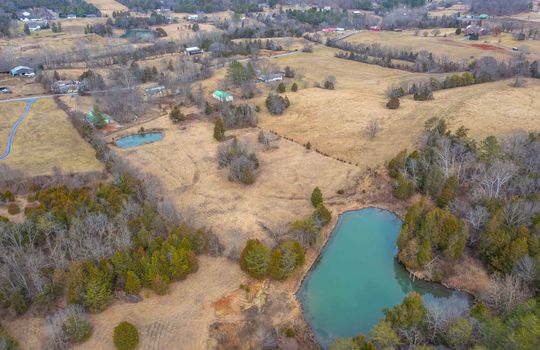 Aerial View of Property From Ponds toward barn