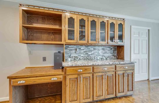kitchen, cabinets, desk, tile backsplash