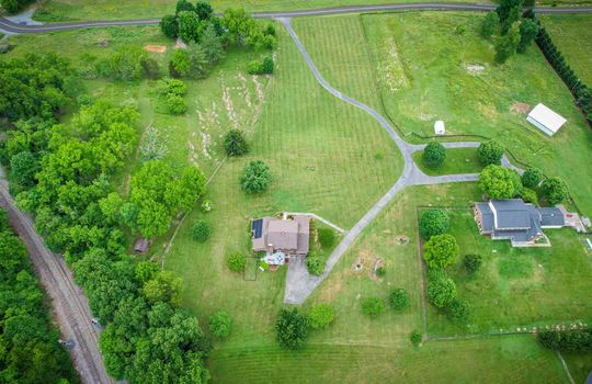 Aerial View from back of property, Yard, Field, Landscaping, Driveway, Road