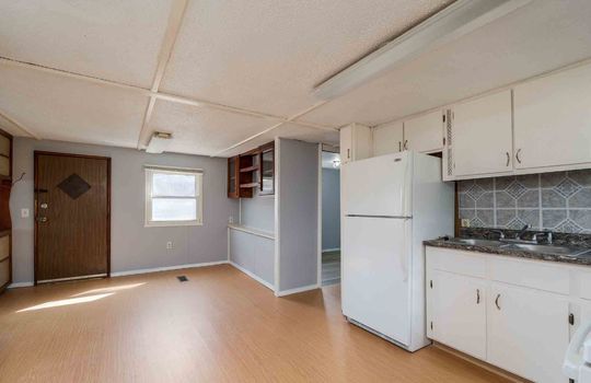 kitchen, door, window, refrigerator, sink, cabinets, counter top