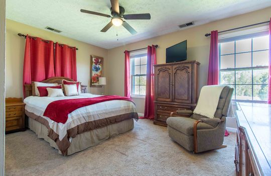 bedroom, ceiling fan, carpet, winows