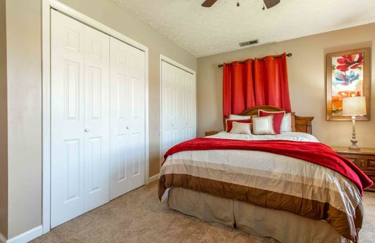 bedroom, carpet, double closets, ceiling fan
