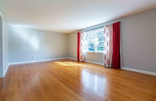 living room, hardwood flooring, windows