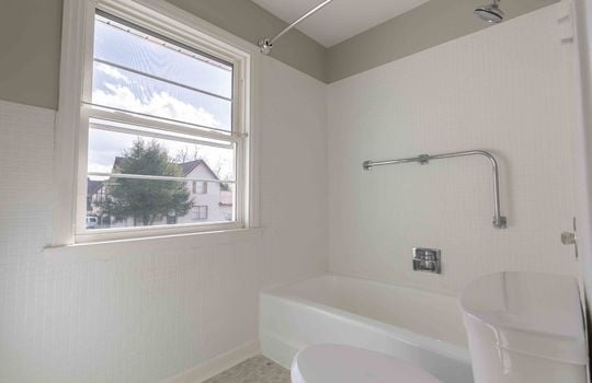bathroom, toilet, tub/ shower, window