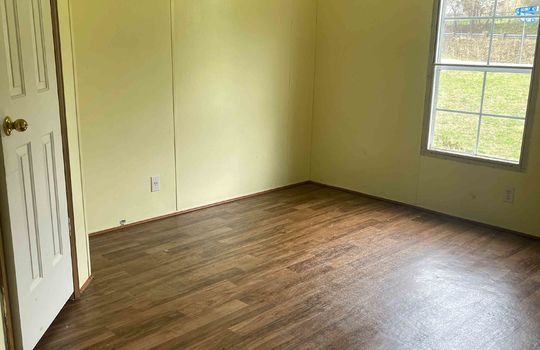bedroom, closet, laminate flooring