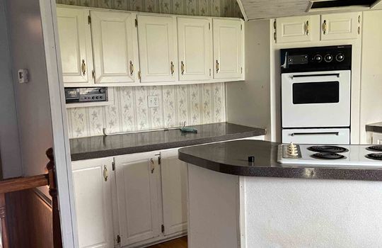 kitchen, island, wall oven, white cabinets