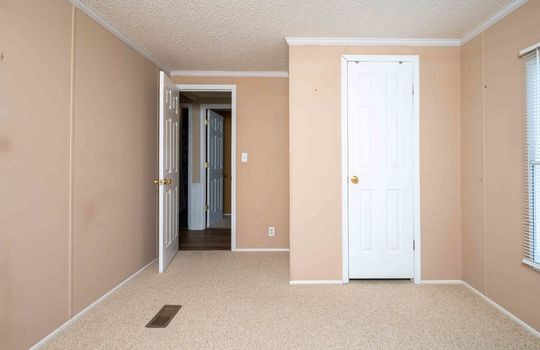 bedroom, closet, carpet, door to hallway
