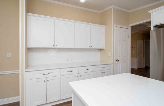 kitchen, cabinets, counters, luxury vinyl flooring