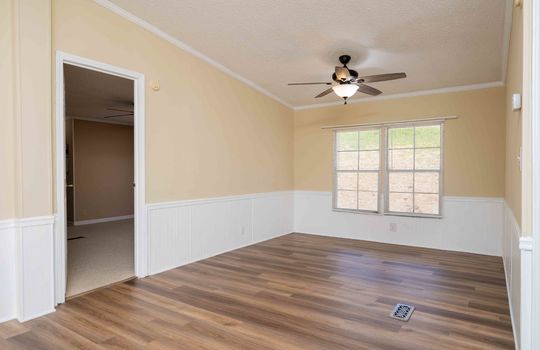 living room, luxury vinyl flooring, celing fan, window
