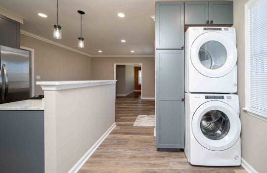 laundry area for stackable washer and dryer, cabinets