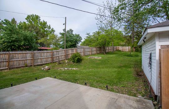 patio, large back yard, fencing, trees