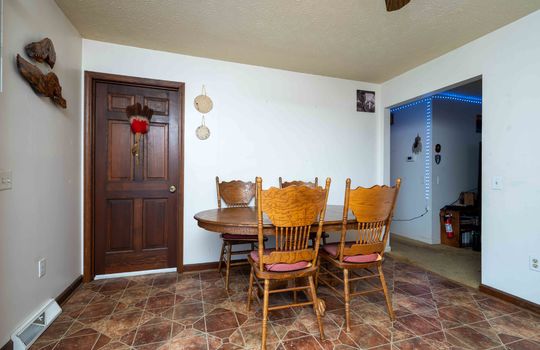 door, dining area, vinyl flooring