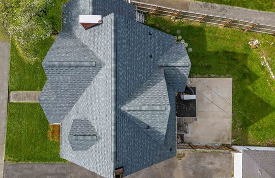 aerial view of home, roof, & patio