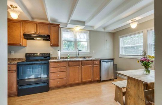 kitchen, cabinets, stove, dishwasher, sink, windows, ceiling beams