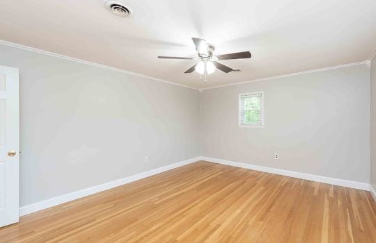 bedroom, ceiling fan, hardwood flooring, window