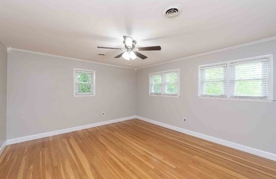 bedroom, ceiling fan, hardwood flooring, windows