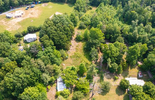 aerial view, 1.10+/- acres, trees, home