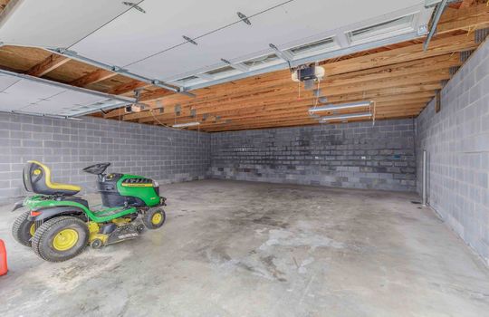 block walls, concrete flooring, garage