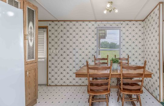 dining area, window, back door, vinyl flooring