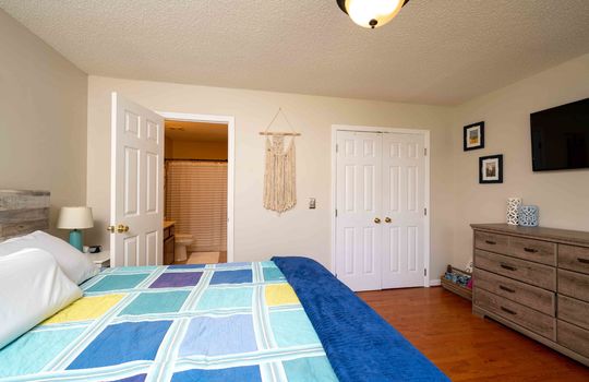 bedroom, hardwood flooring, ensuite door, closet