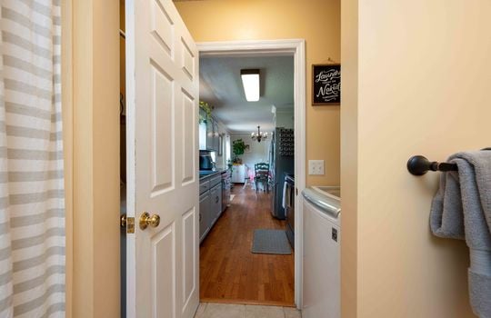 laundry space, doorway to kitchen space.