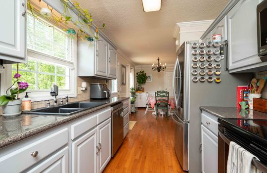 kitchen, cabinets, stove, refrigerator, sink, hardwood flooring