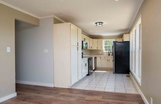 Dining area, hardwood flooring, kitchen, tile flooring