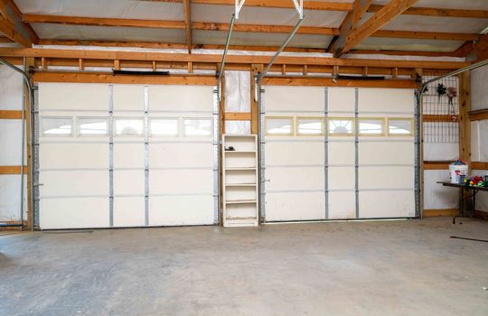 two car garage, garage doors, concrete