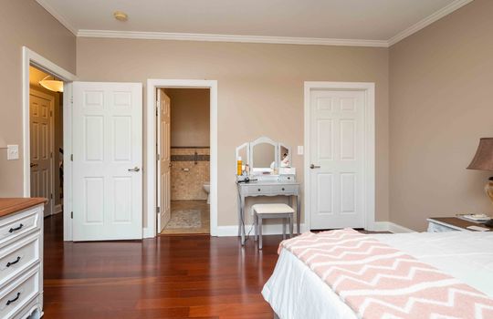 bedroom, cherry hardwood flooring, ceiling fan, window, ensuite