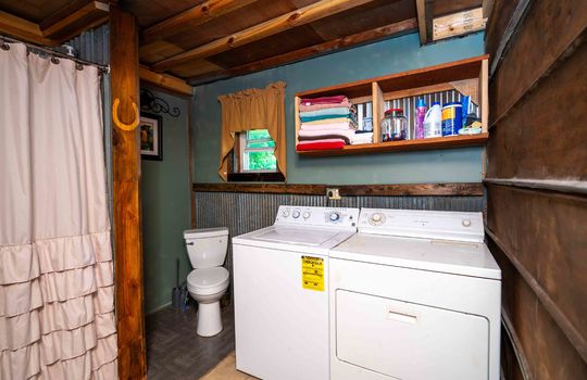 bathroom, toilet, shower/tub, laundry space