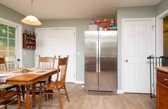 eat in kitchen, door to back yard, stainless refrigerator