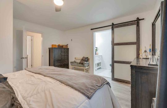 primary bedroom, primary bathroom, barn door, luxury vinyl flooring