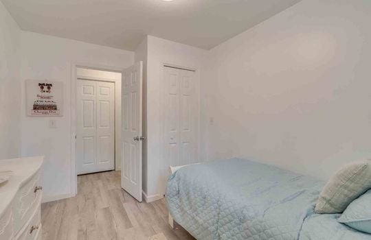 bedroom, closet, door, luxury vinyl flooring